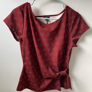 Cute work blouse. Brand new! Burgundy/ deep red with white and blue print.